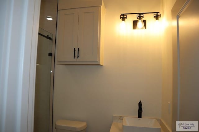 13953 Isaiah Ct, La Feria, TX 78559 - full bathroom featuring a sink and toilet