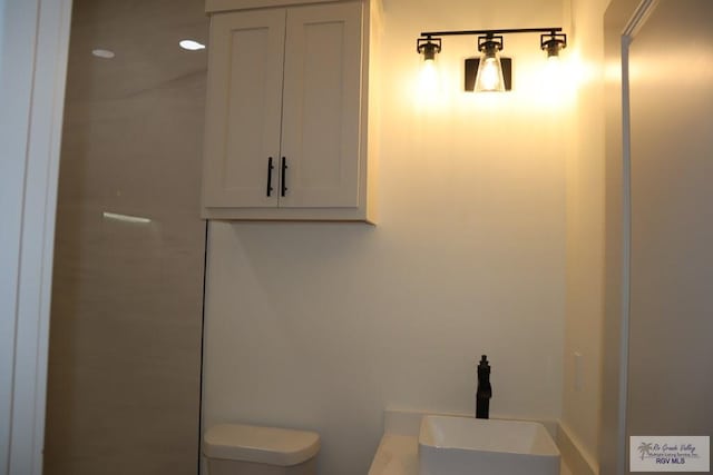 13953 Isaiah Ct, La Feria, TX 78559 - full bath featuring toilet and a sink