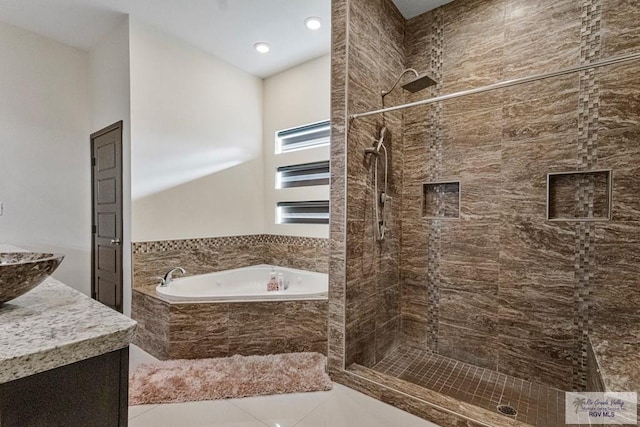 2540 Los Portales Dr, Brownsville, TX 78526 - full bath featuring a garden tub, a tile shower, tile patterned floors, vanity, and recessed lighting