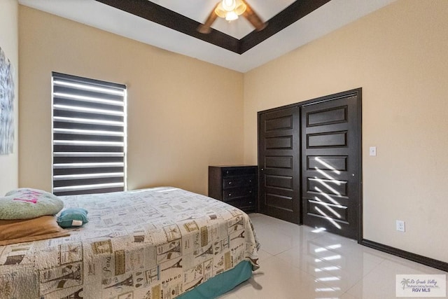 2540 Los Portales Dr, Brownsville, TX 78526 - tiled bedroom featuring baseboards and ceiling fan