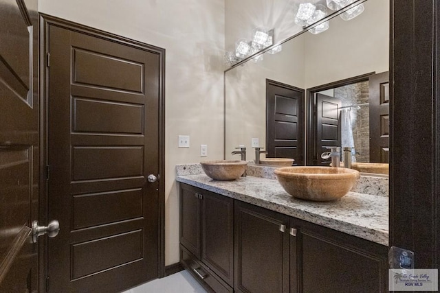 2540 Los Portales Dr, Brownsville, TX 78526 - full bathroom with double vanity