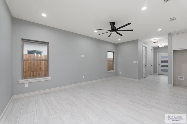 2009 New Combes Rd, Harlingen, TX 78550 - unfurnished room featuring ceiling fan, baseboards, and recessed lighting