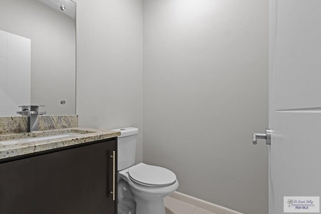 5483 Lovers Ln, Brownsville, TX 78526 - half bathroom with vanity and tile patterned floors