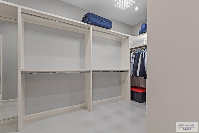 5483 Lovers Ln, Brownsville, TX 78526 - walk in closet featuring tile patterned floors