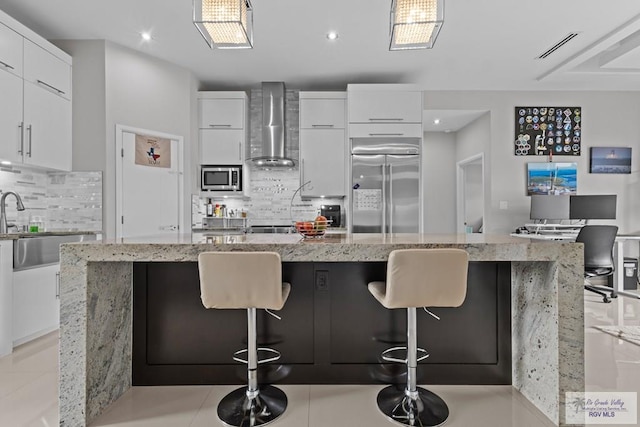 5483 Lovers Ln, Brownsville, TX 78526 - kitchen featuring modern cabinets, decorative backsplash, white cabinets, and recessed lighting