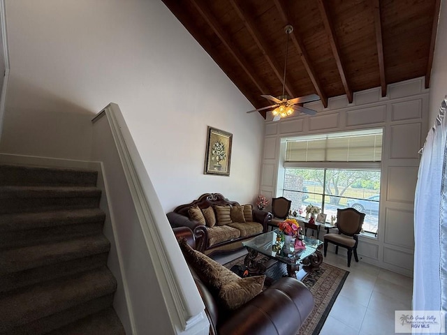 2100 W San Marcelo Blvd Unit 216, Brownsville, TX 78526 - tiled living area with wooden ceiling, high vaulted ceiling, beamed ceiling, stairs, and ceiling fan