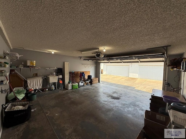 2100 W San Marcelo Blvd Unit 216, Brownsville, TX 78526 - garage featuring a garage door opener