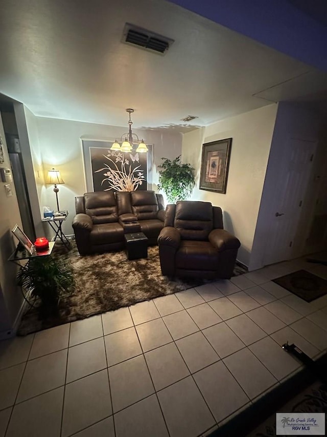 tiled living room with a chandelier