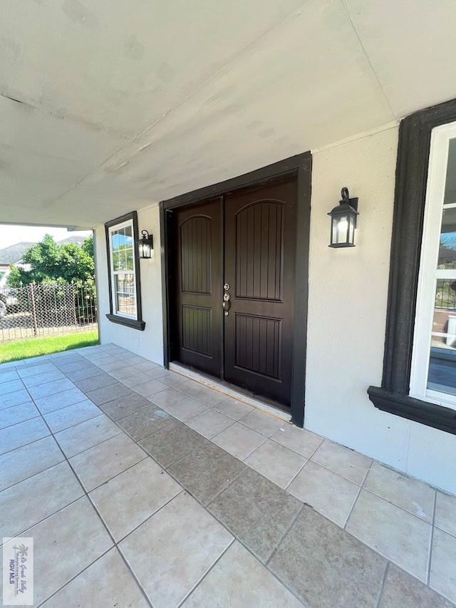 entrance to property with a porch