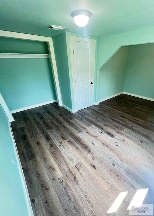 bonus room featuring hardwood / wood-style flooring