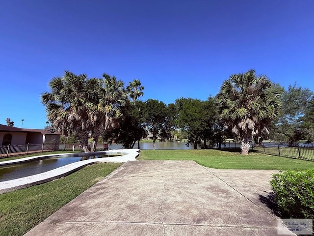 view of community featuring a yard