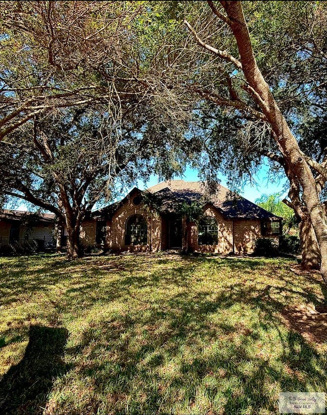 exterior space with a front yard