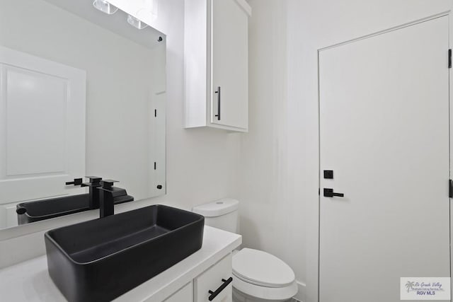 119 Finch Dr, Los Fresnos, TX 78566 - half bath with vanity and toilet
