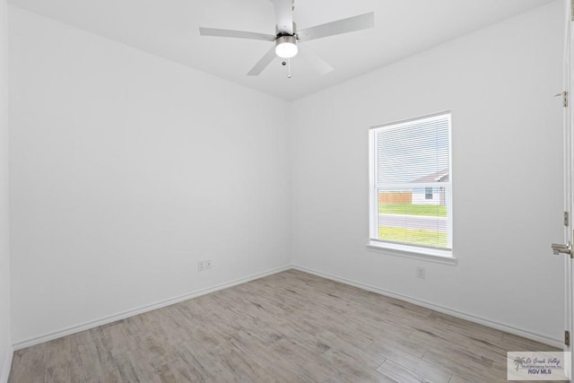 spare room featuring ceiling fan and light hardwood / wood-style floors