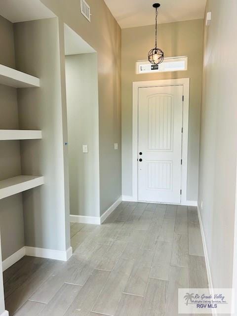 521 Valley Oak Cir, Los Fresnos, TX 78566 - entrance foyer with wood finish floors and baseboards
