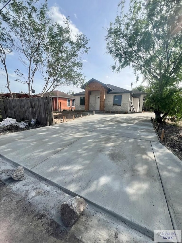 24824 Birch St Unit 12, San Benito, TX 78586 - view of front of home with stone siding