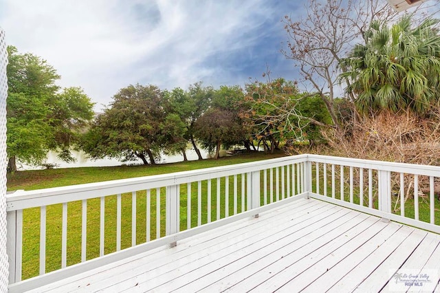 deck featuring a lawn