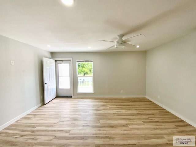 unfurnished room with baseboards, a ceiling fan, light wood-style flooring, and recessed lighting