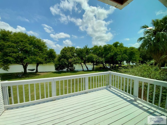 wooden deck with a yard