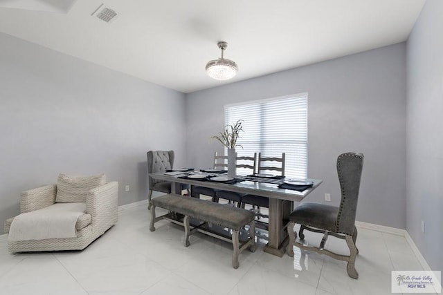 9129 Lake Charles Dr, Los Fresnos, TX 78566 - dining space with baseboards