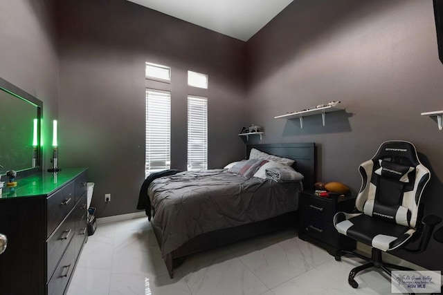 9129 Lake Charles Dr, Los Fresnos, TX 78566 - bedroom featuring light marble finish floors