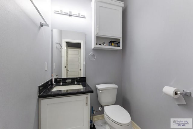 9129 Lake Charles Dr, Los Fresnos, TX 78566 - bathroom with toilet and vanity