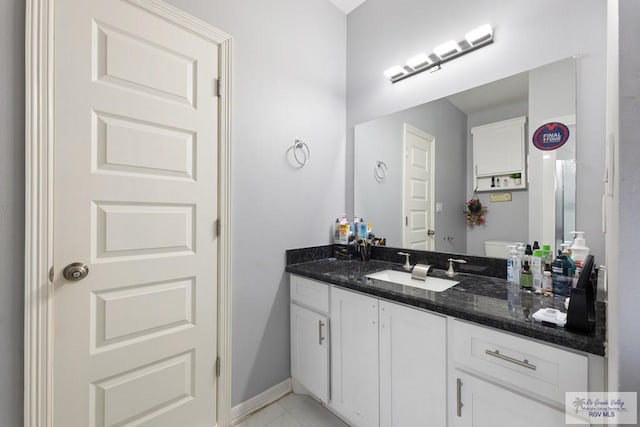 9129 Lake Charles Dr, Los Fresnos, TX 78566 - bathroom featuring vanity and tile patterned flooring