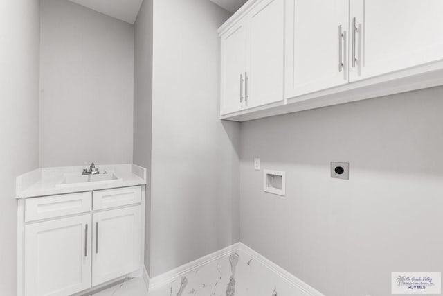 laundry room featuring cabinets, hookup for an electric dryer, hookup for a washing machine, and sink