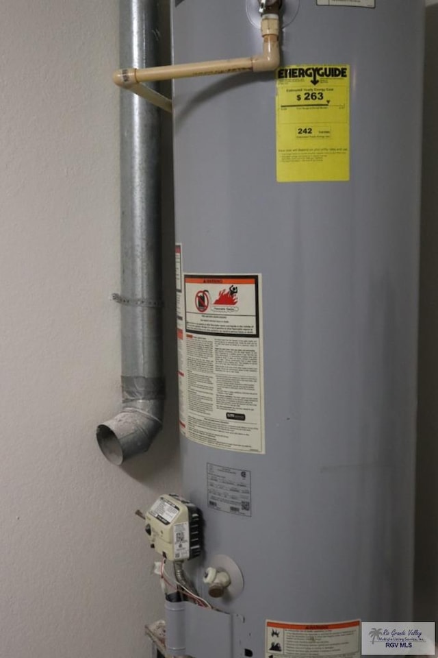 utility room with water heater