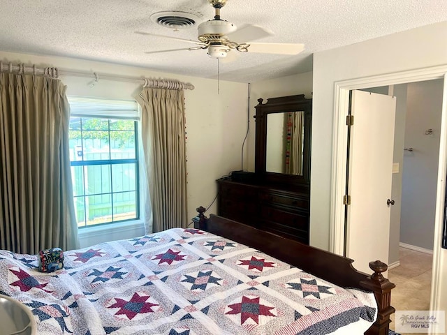 501 W Palm Valley Dr, Harlingen, TX 78552 - bedroom with a ceiling fan, a textured ceiling, and visible vents