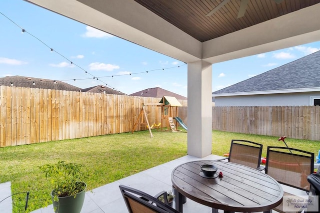 view of patio featuring a playground