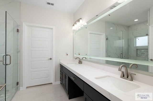 bathroom with vanity, an enclosed shower, and toilet