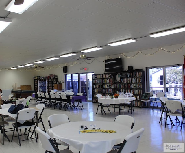 dining space featuring ceiling fan