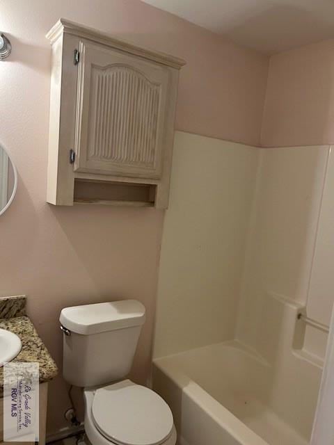 full bathroom featuring vanity, toilet, and separate shower and tub