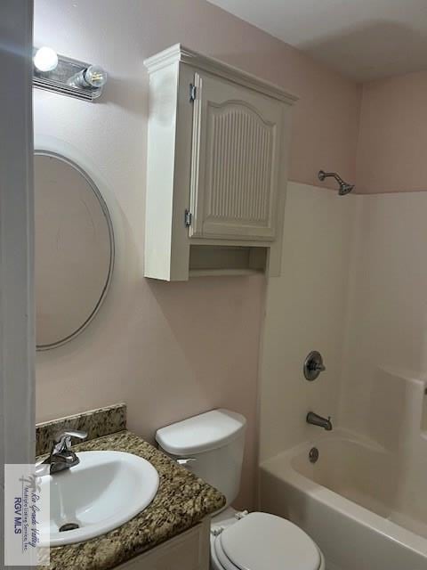 full bathroom with shower / bathtub combination, vanity, and toilet