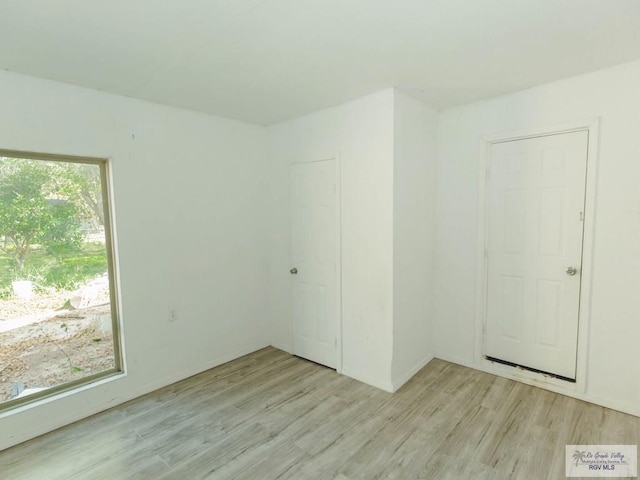 empty room featuring light wood-type flooring