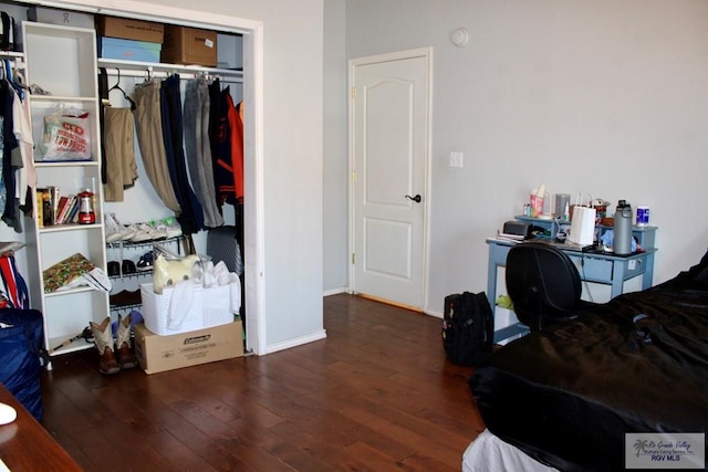 1272 Costa Del Sol Dr, Brownsville, TX 78520 - bedroom featuring hardwood / wood-style flooring, a closet, and baseboards