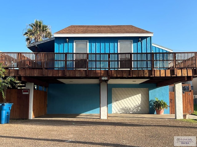 rear view of house with a deck