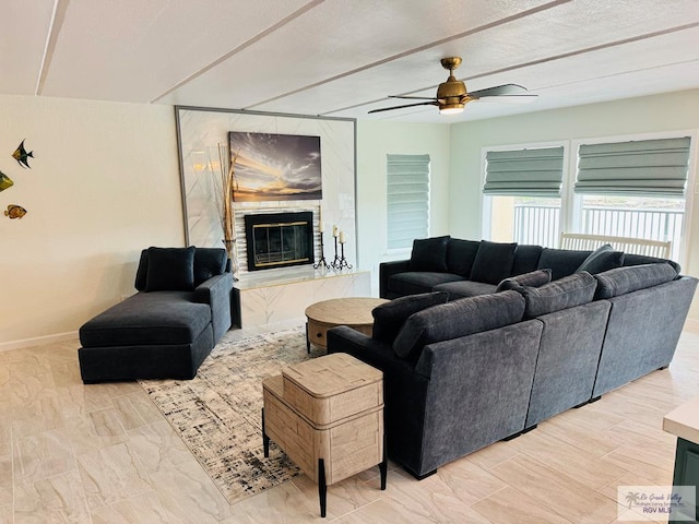 living room with ceiling fan