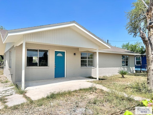 view of front of property with a patio