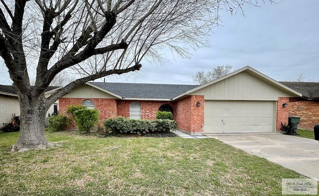 ranch-style home with a front yard and a garage