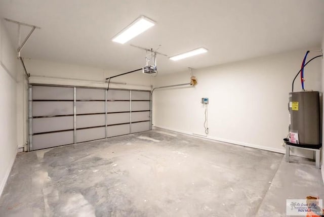 garage featuring a garage door opener and water heater