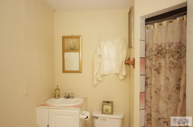 825 E Vinson Ave, Harlingen, TX 78550 - bathroom with vanity and a shower with shower curtain