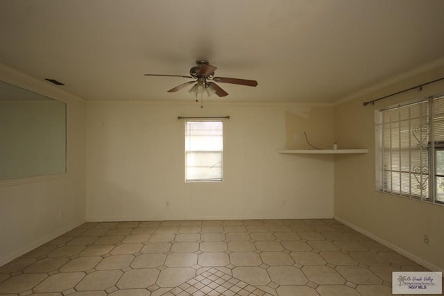 825 E Vinson Ave, Harlingen, TX 78550 - empty room with ceiling fan, plenty of natural light, ornamental molding, and light floors
