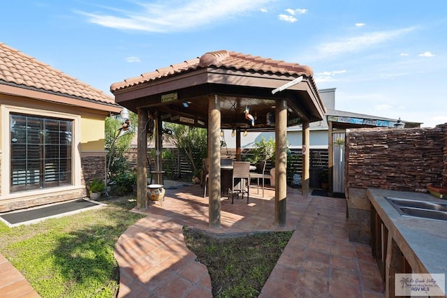 view of patio featuring a gazebo