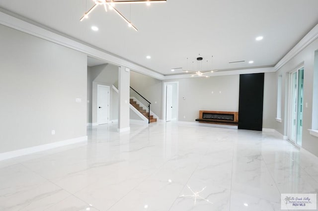 unfurnished living room with crown molding