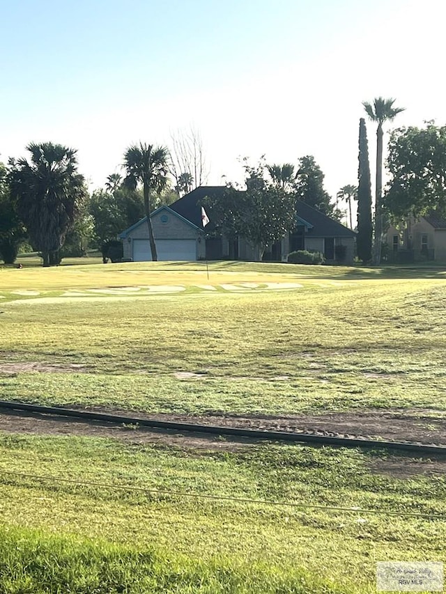 view of yard with a garage