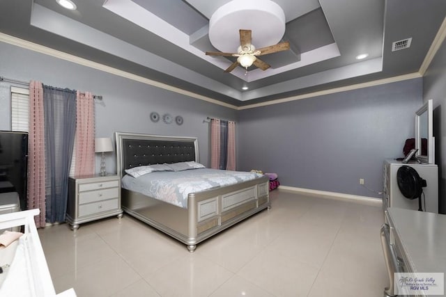 bedroom with a raised ceiling, crown molding, light tile patterned floors, and ceiling fan