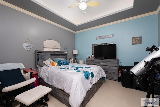 tiled bedroom with crown molding, ceiling fan, and a tray ceiling