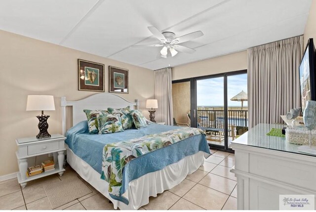 tiled bedroom featuring access to outside and ceiling fan